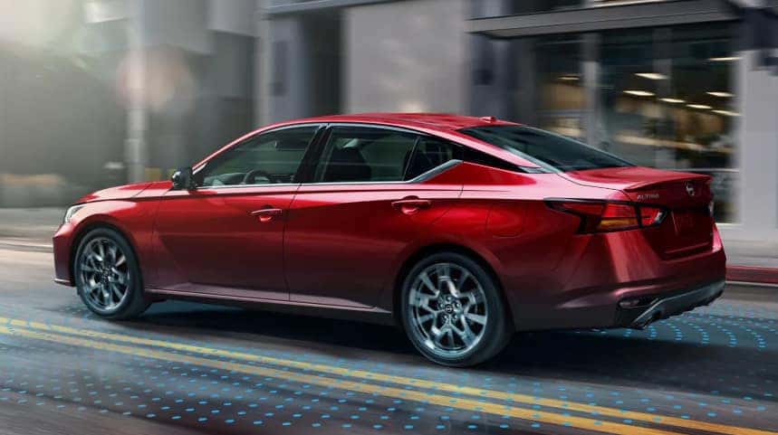 Red Nissan Sedan