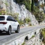 White 2020 Acura MDX on Highway Near Water