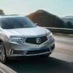 Acura MDX driving near the ocean