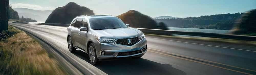 Acura MDX driving near the ocean