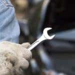 car mechanic holding the wrench