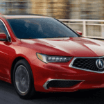 red 2019 Acura TLX driving fast