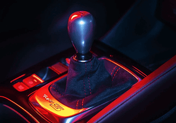 Close-up of 2026 Acura Integra Type S manual shift knob with illuminated TYPE S badge