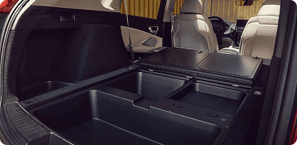2026 Acura RDX rear cargo area showing under-floor storage with rear seat folded
