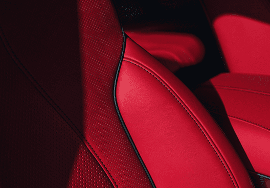 Close-up of 2026 Acura RDX red perforated leather seats