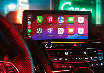 2026 Acura RDX cockpit with Apple CarPlay infotainment display and red ambient lighting