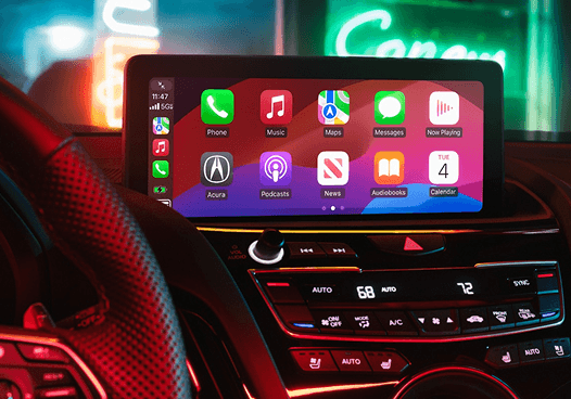 2026 Acura RDX cockpit with Apple CarPlay infotainment display and red ambient lighting