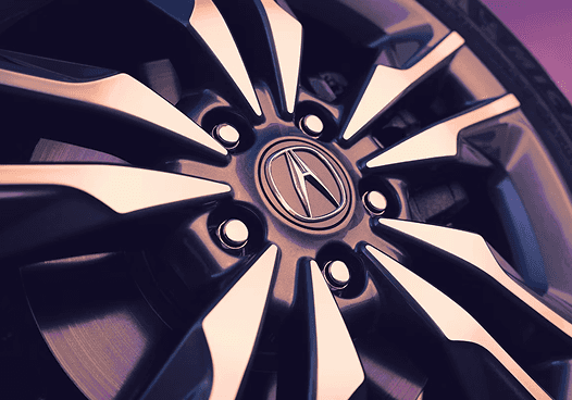 Close-up of 2026 Acura ADX alloy wheel with Acura center cap