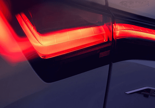 Close-up of 2026 Acura ADX glowing red LED taillight