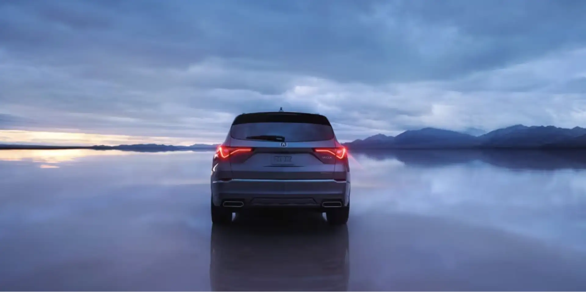The 2026 Acura MDX with Advance Package in Liquid Carbon Metallic