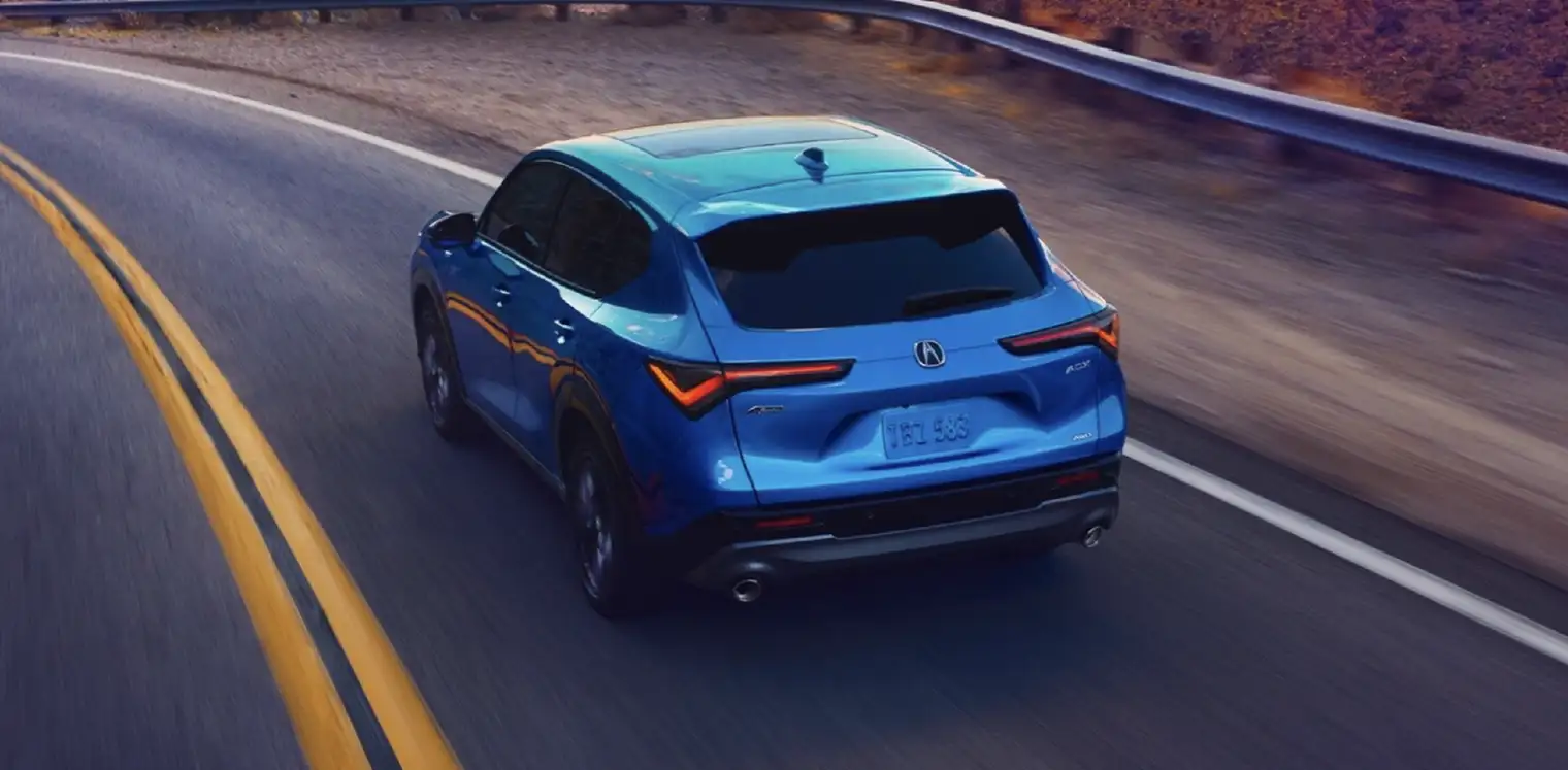 Acura ADX SUV rear view on the road