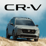 2026 honda cr-v trailsport in ash green metallic at the peak of a dusty road