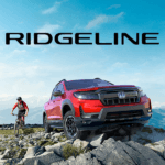2026 Honda Ridgeline in Radiant Red Metallic at the peak of a mountain with a bicyclist on his bike next to the truck. logo in black in the sky