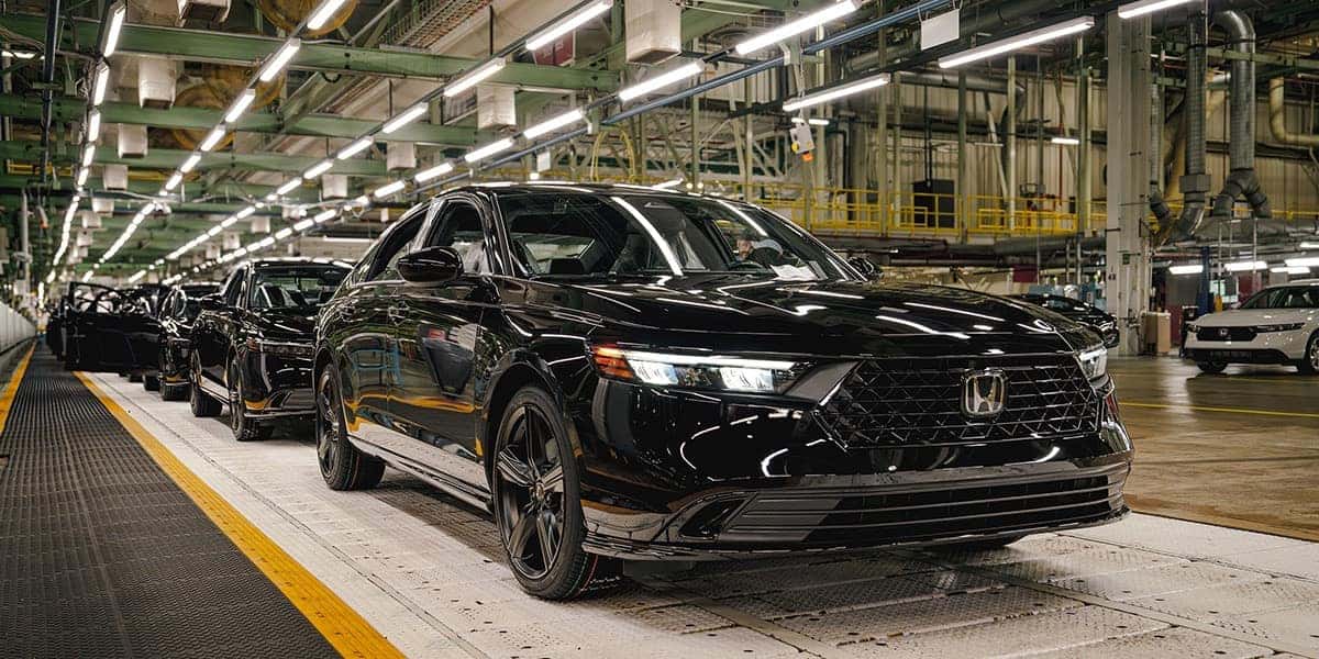 2026 Honda Accord in Crystal Black Pearl on a production line in a factory