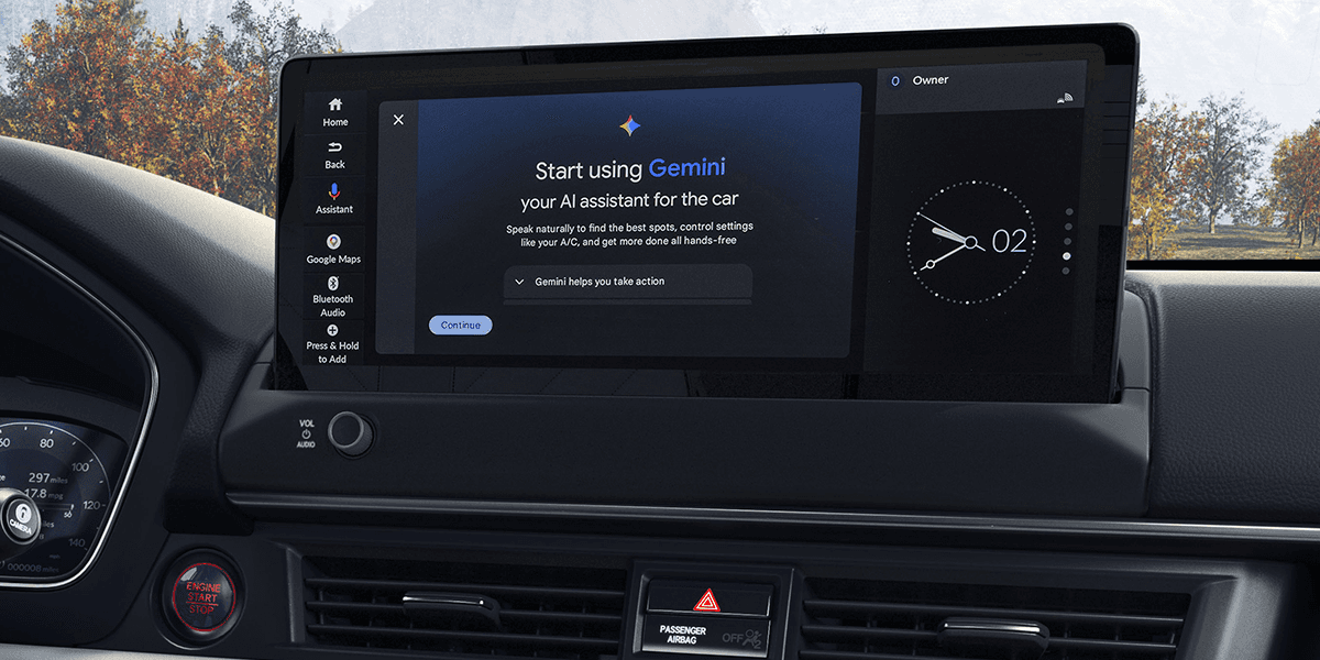 Google Gemini AI Assistant displayed on a touchscreen in a Honda with a mountain view out the window behind it.