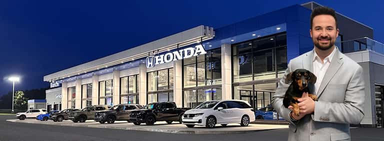 bianchi honda storefront at night with cars parked on front step while an overlay of jason porreco is staged right