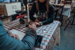 man and woman on a date at a restaurant