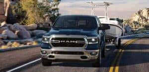 2024 RAM 1500 towing a boat on the road