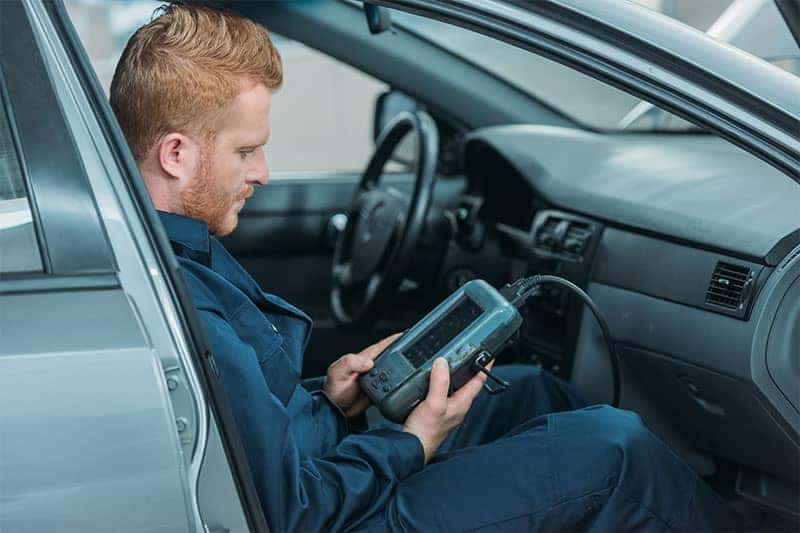 Savvy mechanic checks Diagnostic Codes