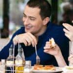 friends enjoying cafe meal