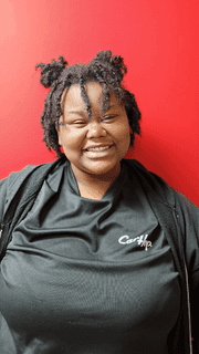 Smiling salesperson at CarHop in Tulsa, OK