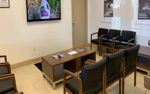 Chico Hyundai service waiting room with charis and tv
