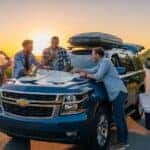 friends making a pit stop when traveling with a modern Chevrolet vehicle