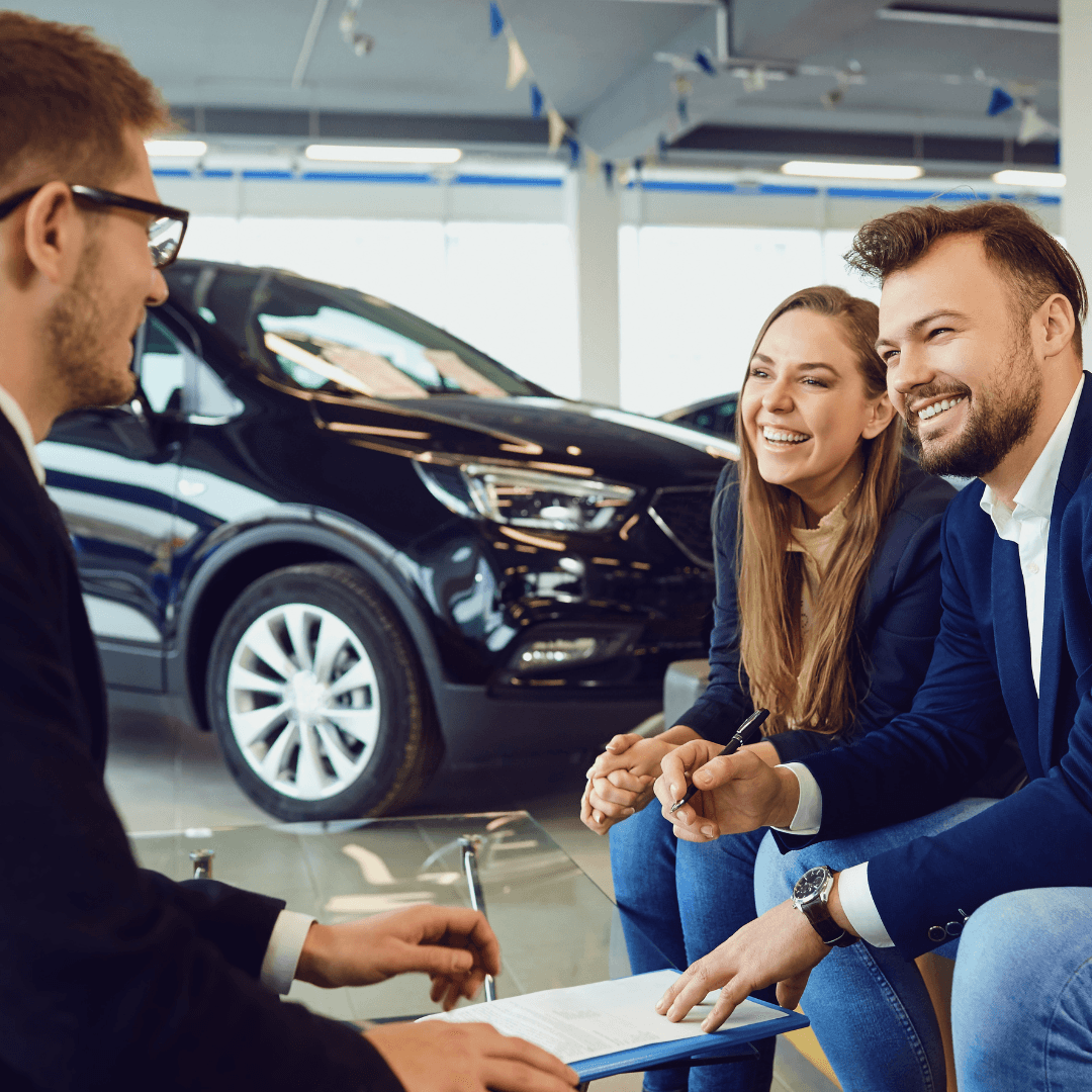 Car salesman making a sale