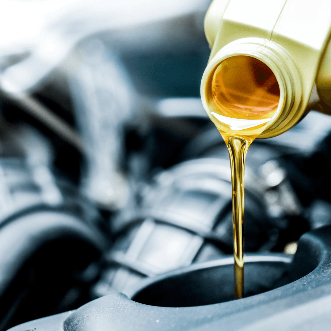 Pouring oil for oil change