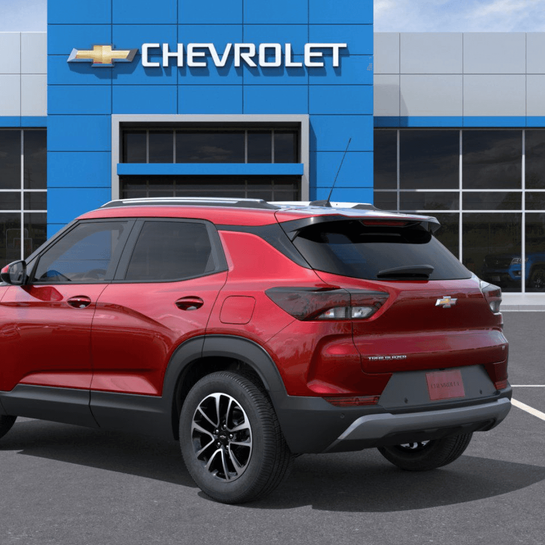 Red trailblazer in front of Chevy Dealership