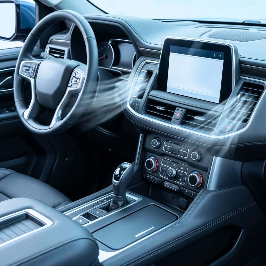 The dashboard and air conditioning vents inside a cool, comfortable Chevrolet vehicle.