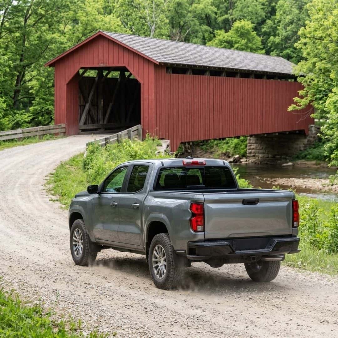 Chevy Colorado Trail Boss going down a dirt road