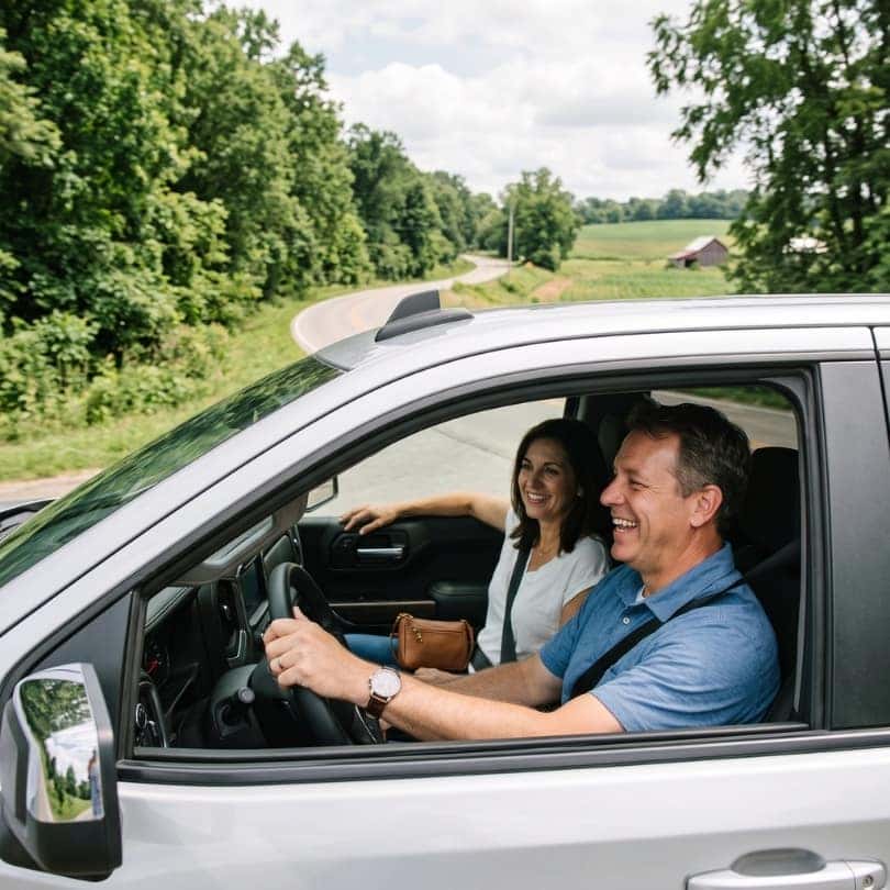 A couple test-driving a truck