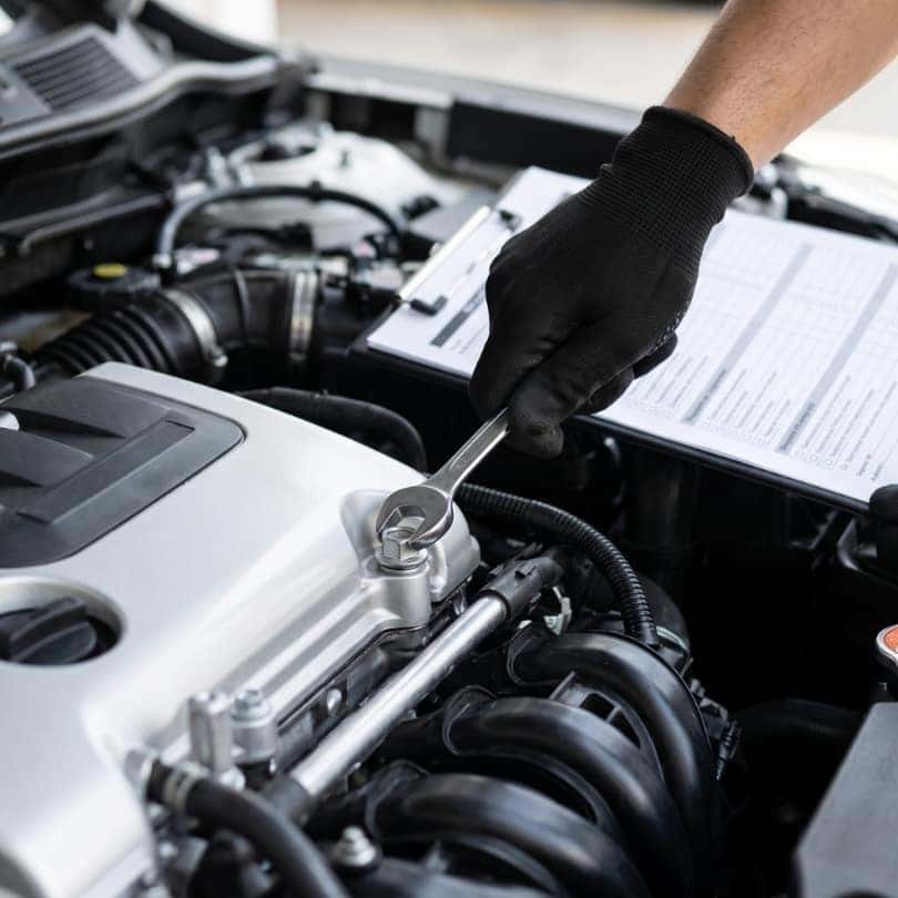 Mechanic working on engine