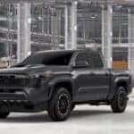 Black 2026 Toyota Tacoma TRD Sport shown from a front three-quarter angle