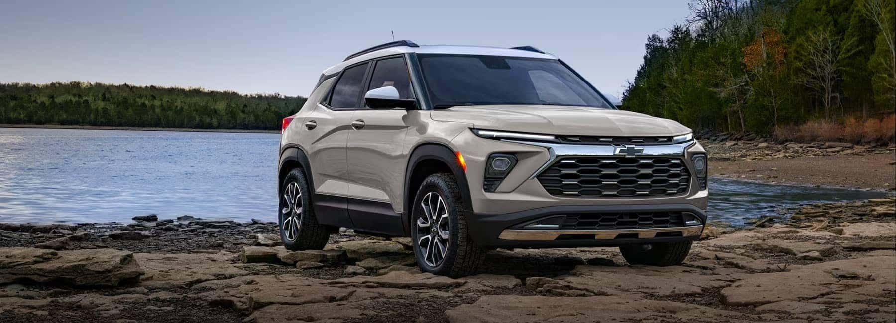 2026 Chevrolet Trailblazer parked on rocks next to lake