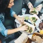 A group of young people eating food - El Dorado Chevrolet in McKinney, Texas