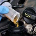 A person performing an oil change - El Dorado Chevrolet in McKinney, Texas