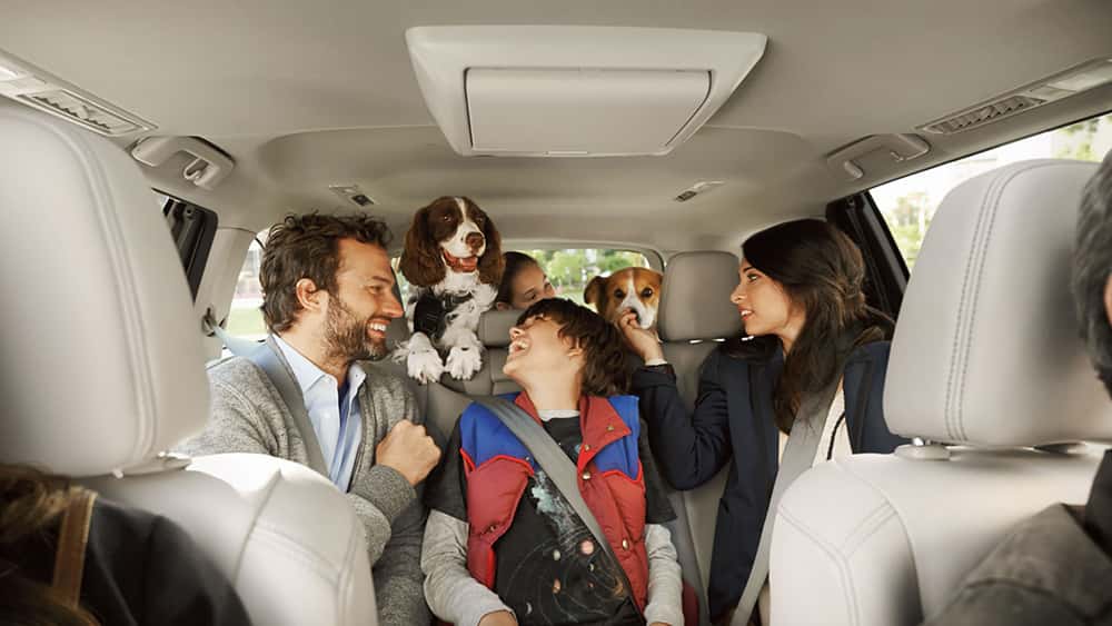 Family inside Toyota Highlander