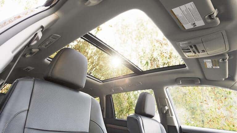 Sun shining through Toyota Highlander sunroof