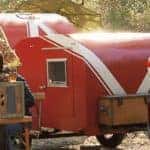 Tow red trailer with 2019 Toyota Highlander to sell fruit