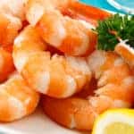 Fresh shrimp on an aqua background
