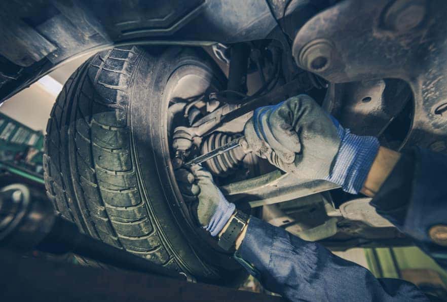 Mechanic working on car