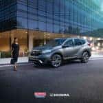 A woman approaching a Honda CR-V