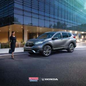 A woman approaching a Honda CR-V