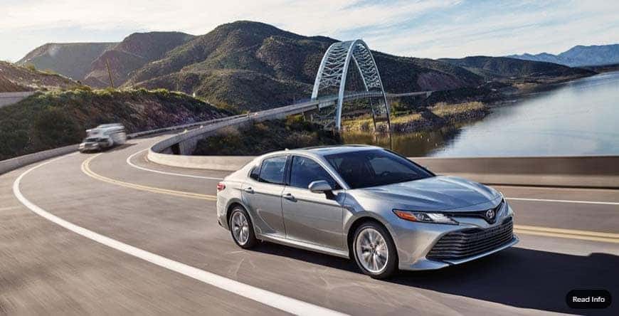 Silver/Grey Toyota Camry on road 