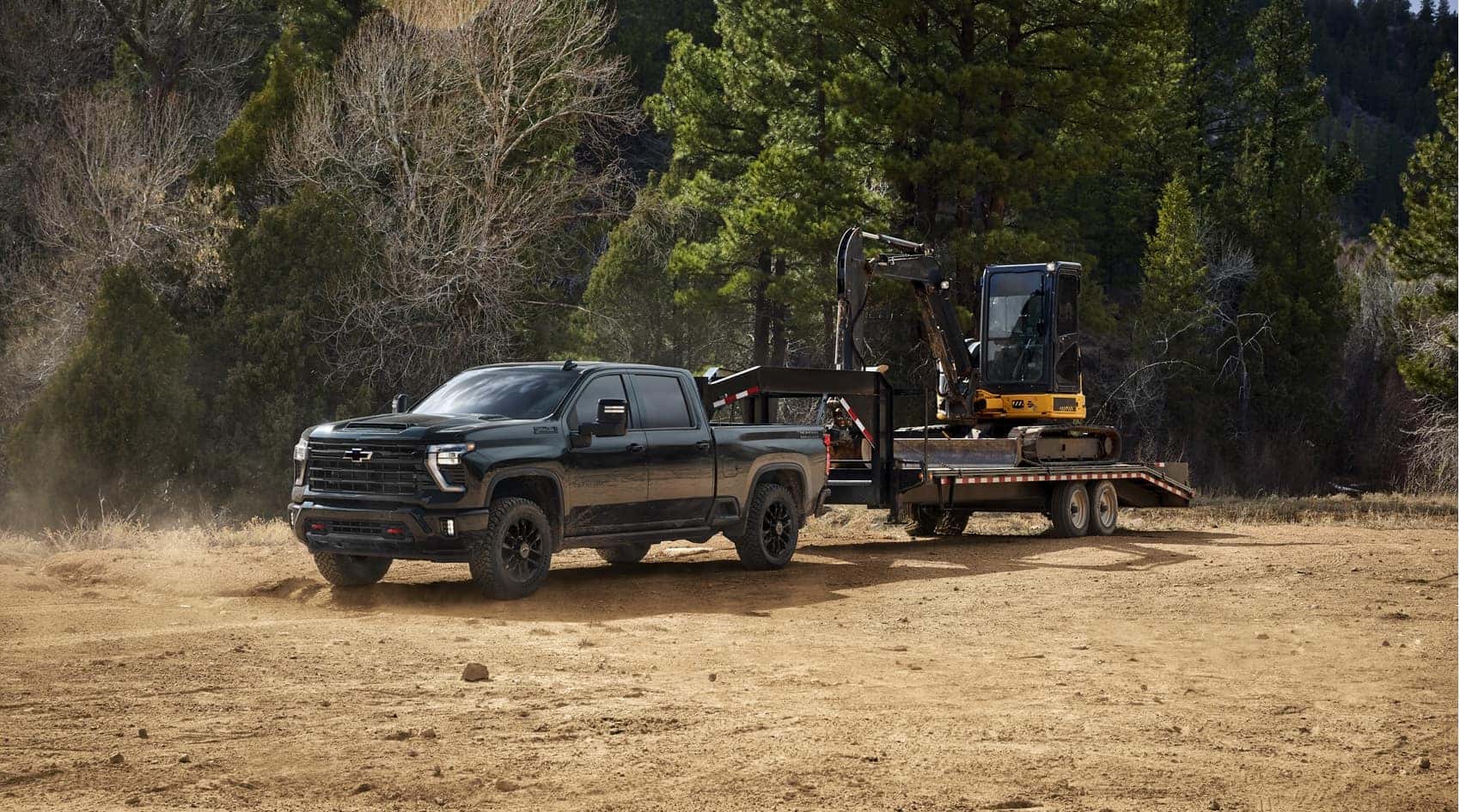 Chevy Silverado towing machinery from Chevrolet Dealer near Me