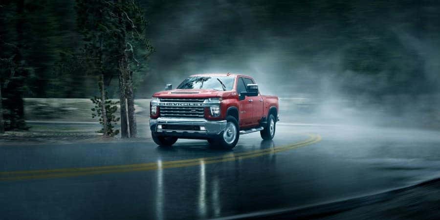 A 2021 Chevrolet Silverado 2500HD on a wet road | Graff Chevrolet in Grand Prairie, Texas 