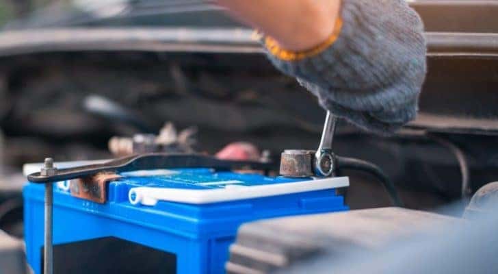 A mechanic is shown installing one of the most popular Toyota TrueStart batteries.