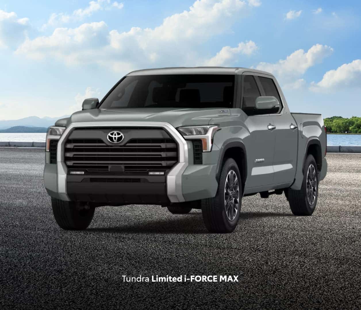  Toyota Tundra Limited i-FORCE MAX in gray shown from a front three-quarter angle near a lake.